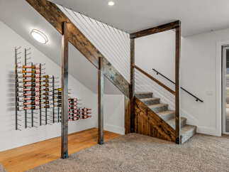 This stunning property boasts a unique wine cellar design, perfect for entertaining and showcasing your collection.