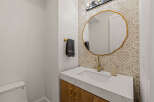 This stunning bathroom features a modern design with a touch of elegance.