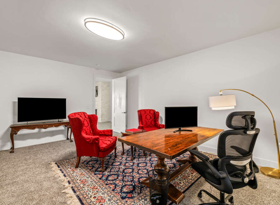 This stunning property boasts a beautifully designed home office, perfect for remote work or creative endeavors.