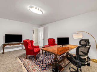 This stunning property boasts a beautifully designed home office, perfect for remote work or creative endeavors.