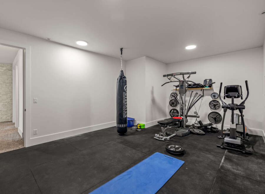 This home gym offers a dedicated space for fitness enthusiasts.