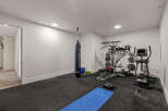 This home gym offers a dedicated space for fitness enthusiasts.