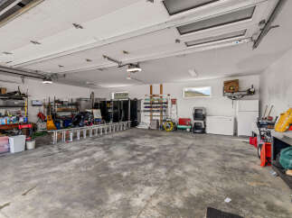 This spacious garage offers ample room for storage and projects.