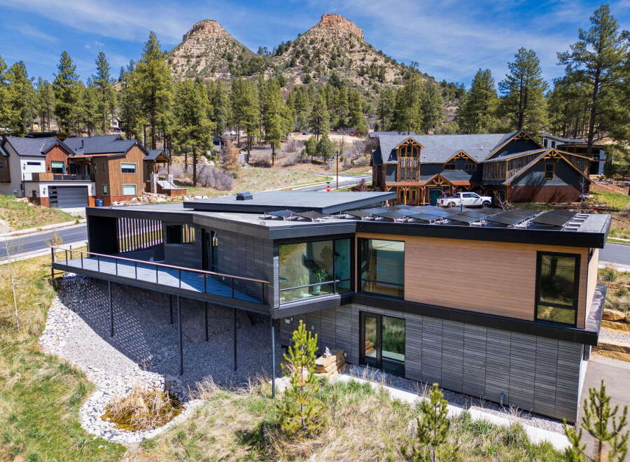 Discover modern luxury in this stunning home, boasting sleek architecture and breathtaking mountain views.