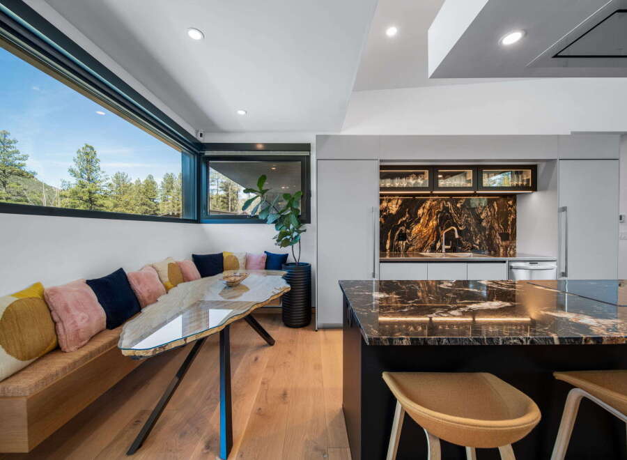 Experience luxury living in this stunning kitchen and dining area.