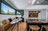 Experience luxury living in this stunning kitchen and dining area.