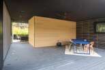 This stunning outdoor space offers a perfect blend of modern design and natural elements.