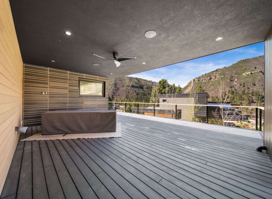 Enjoy breathtaking mountain views from this stunning outdoor deck.