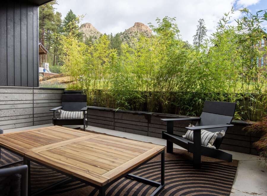 Enjoy the serene beauty of this outdoor patio, perfect for relaxation and entertaining.