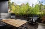 Enjoy the serene beauty of this outdoor patio, perfect for relaxation and entertaining.