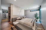 Step into luxury with this stunning bedroom featuring a modern design and elegant finishes.