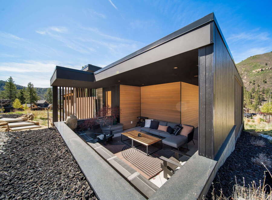 Experience modern luxury in this stunning property, featuring a beautifully designed outdoor living space.