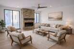 Experience luxury living in this stunning property featuring a cozy fireplace, perfect for those chilly evenings.