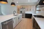 This stunning kitchen boasts modern design and high-end finishes, perfect for culinary enthusiasts.