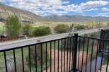 Enjoy breathtaking mountain views from this stunning property! This home offers a serene setting with a private balcony overlooking a picturesque landscape.