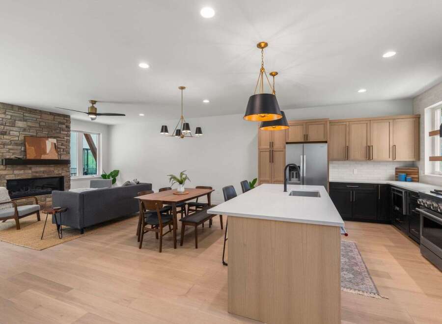 Step into modern luxury with this stunning home! Featuring a gourmet kitchen with sleek countertops and stainless steel appliances, perfect for culinary enthusiasts.