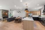 Step into modern luxury with this stunning home! Featuring a gourmet kitchen with sleek countertops and stainless steel appliances, perfect for culinary enthusiasts.