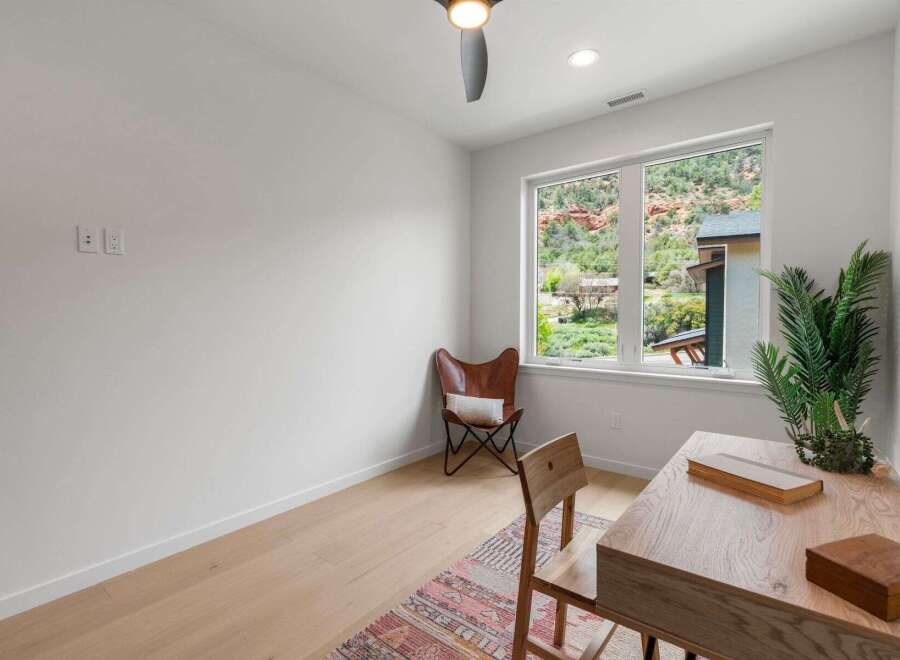 This stunning room offers a perfect blend of modern design and natural beauty.