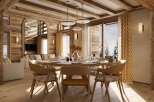 Experience luxury living in this stunning property, featuring a beautifully designed dining area with a round table and stylish chairs.