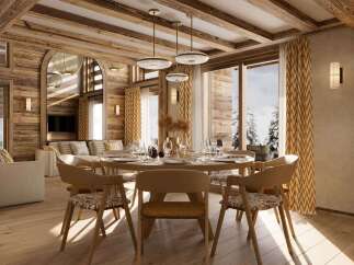 Experience luxury living in this stunning property, featuring a beautifully designed dining area with a round table and stylish chairs.