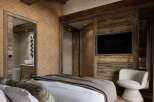 Experience rustic elegance in this stunning bedroom.