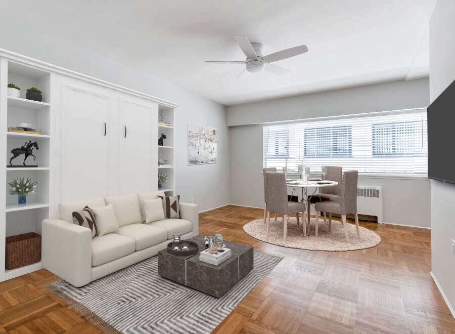 Discover modern living in this stylish apartment! Featuring a bright living area with a comfortable sofa and a chic coffee table, perfect for relaxing or entertaining.