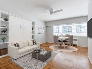 Discover modern living in this stylish apartment! Featuring a bright living area with a comfortable sofa and a chic coffee table, perfect for relaxing or entertaining.