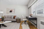 This stylish living space features a modern design with a comfortable sofa, perfect for relaxation.