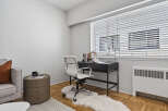 This stylish apartment features a modern home office space, perfect for remote work or creative projects.