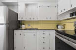 Step into a charming kitchen with a classic design.