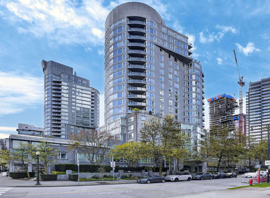 Discover luxury living in this stunning high-rise condo, boasting modern architecture and breathtaking city views.