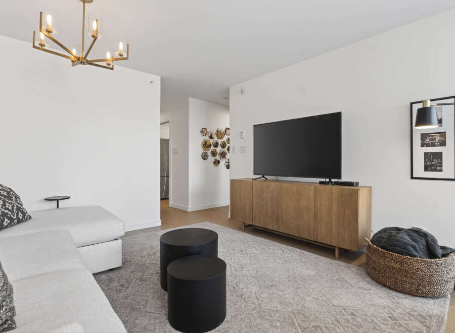 Step into modern elegance with this stunning living space.