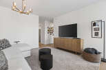 Step into modern elegance with this stunning living space.