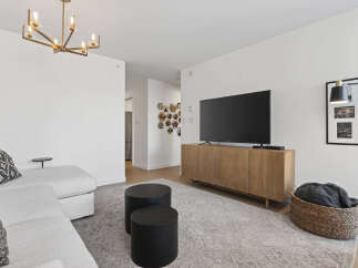 Step into modern elegance with this stunning living space.