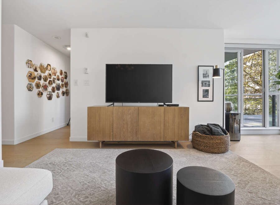 Step into modern elegance with this stunning living space.
