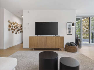 Step into modern elegance with this stunning living space.