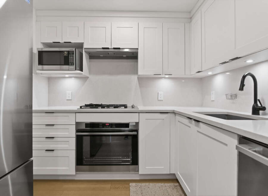 This stunning kitchen boasts modern design and functionality.