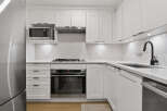 This stunning kitchen boasts modern design and functionality.
