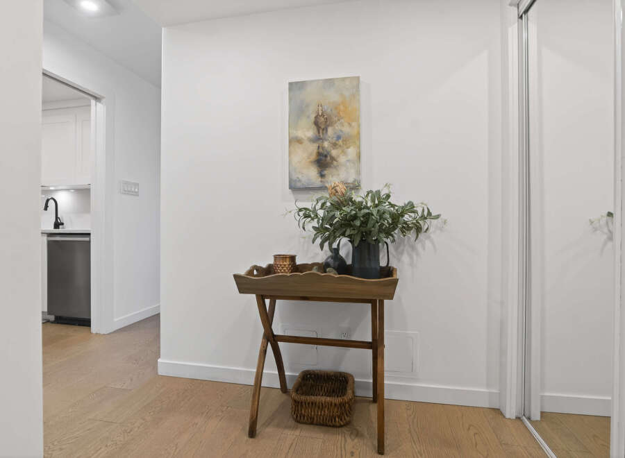 This stunning property boasts a bright and airy hallway, perfect for welcoming guests.