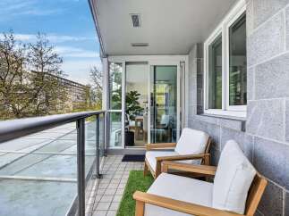 Enjoy the tranquility of this stunning balcony, perfect for relaxation and outdoor living.