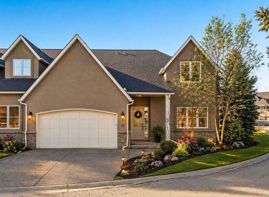 This stunning property boasts a beautifully designed exterior with a welcoming facade.