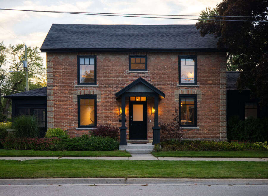 This stunning brick home exudes timeless charm and curb appeal.