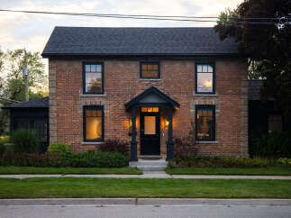 This stunning brick home exudes timeless charm and curb appeal.