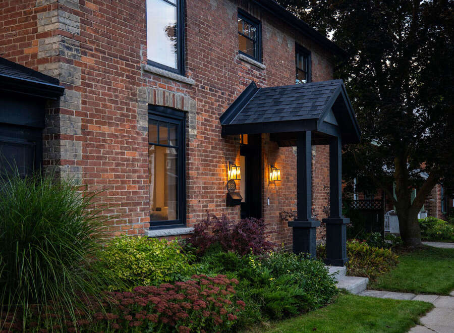 This stunning brick home exudes timeless charm and curb appeal.