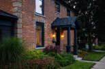 This stunning brick home exudes timeless charm and curb appeal.