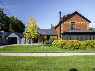 This charming brick home offers a blend of classic architecture and modern updates.