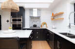 This stunning kitchen boasts modern design and functionality.