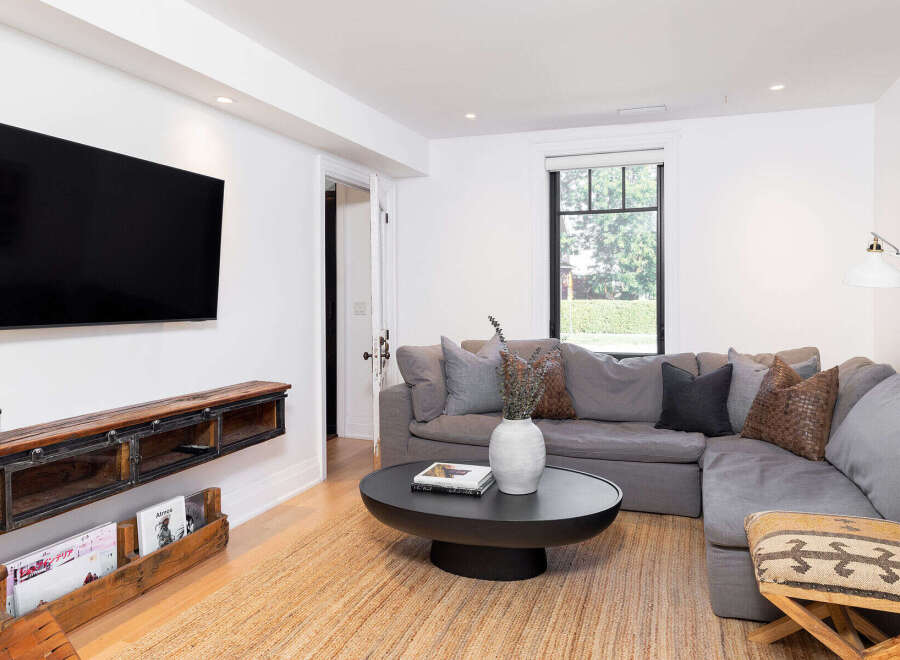 Step into modern elegance with this stunning living space.