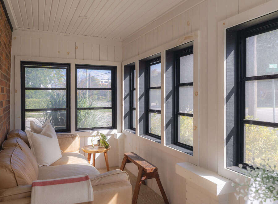 Enjoy the charm of this sun-drenched porch, perfect for relaxation and entertaining.