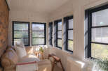 Enjoy the charm of this sun-drenched porch, perfect for relaxation and entertaining.